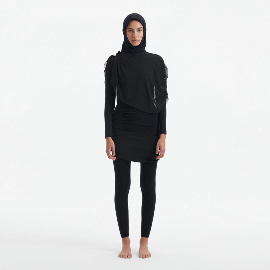 Risha Black Swim Hijab | Moeva | Women Hair Accessories | Each week unveils new pieces—luxury swimwear, fluid resort silhouettes, and elevated summer-to-evening essentials designed to carry you from coastal escapes to city nights.
