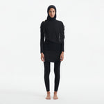 Risha Black Swim Hijab | Moeva | Women Hair Accessories | Each week unveils new pieces—luxury swimwear, fluid resort silhouettes, and elevated summer-to-evening essentials designed to carry you from coastal escapes to city nights.