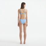 Aeron Baby Blue V Neck Textured Mid Coverage Bikini Set | Moeva | | Each week unveils new pieces—luxury swimwear, fluid resort silhouettes, and elevated summer-to-evening essentials designed to carry you from coastal escapes to city nights.