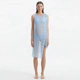Adora Baby Blue Sheer Sleeveless Asymmetric Dress with Gold Button Detail | Moeva | Dress | Each week unveils new pieces—luxury swimwear, fluid resort silhouettes, and elevated summer-to-evening essentials designed to carry you from coastal escapes to city nights.