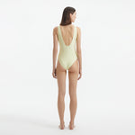 Naida Yellow V Neck Textured Swimsuit | Moeva | Swimsuit | Each week unveils new pieces—luxury swimwear, fluid resort silhouettes, and elevated summer-to-evening essentials designed to carry you from coastal escapes to city nights.