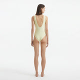 Naida Yellow V Neck Textured Swimsuit | Moeva | Swimsuit | Each week unveils new pieces—luxury swimwear, fluid resort silhouettes, and elevated summer-to-evening essentials designed to carry you from coastal escapes to city nights.