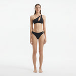 Eyre Black One Shoulder Mid Coverage Textured Bikini Set | Moeva | Bikini Set | Each week unveils new pieces—luxury swimwear, fluid resort silhouettes, and elevated summer-to-evening essentials designed to carry you from coastal escapes to city nights.