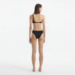 Eyre Black One Shoulder Mid Coverage Textured Bikini Set | Moeva | Bikini Set | Each week unveils new pieces—luxury swimwear, fluid resort silhouettes, and elevated summer-to-evening essentials designed to carry you from coastal escapes to city nights.