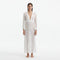 Fernanda White Knitted Mesh Long-Sleeve Maxi Dress | Moeva | Beachwear Dresses | Each week unveils new pieces—luxury swimwear, fluid resort silhouettes, and elevated summer-to-evening essentials designed to carry you from coastal escapes to city nights.