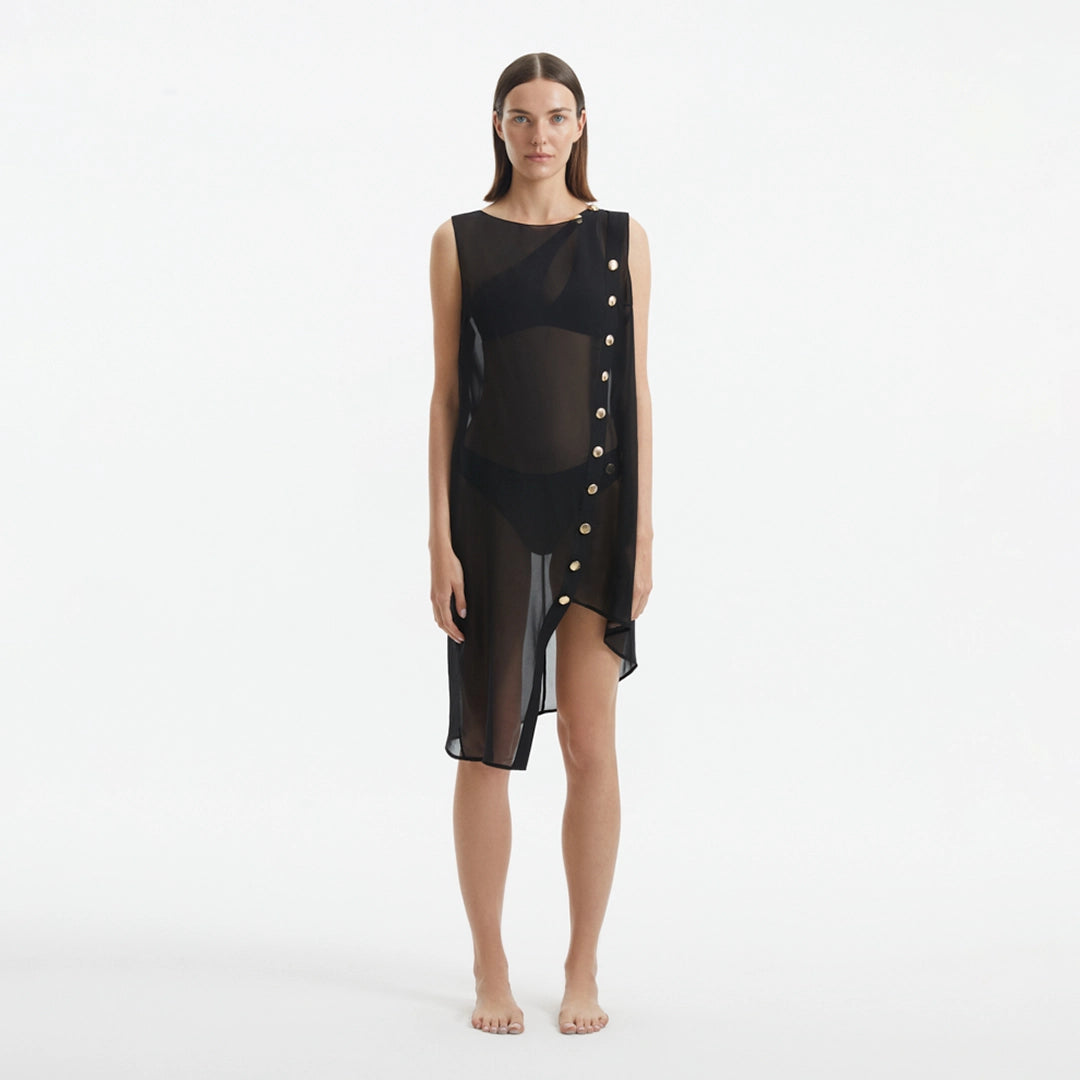 Adora Black Sheer Sleeveless Asymmetric Dress with Gold Button Detail | Moeva | Dress | Each week unveils new pieces—luxury swimwear, fluid resort silhouettes, and elevated summer-to-evening essentials designed to carry you from coastal escapes to city nights.