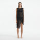 Adora Black Sheer Sleeveless Asymmetric Dress with Gold Button Detail | Moeva | Dress | Each week unveils new pieces—luxury swimwear, fluid resort silhouettes, and elevated summer-to-evening essentials designed to carry you from coastal escapes to city nights.