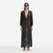 Fernanda Black Knitted Mesh Long-Sleeve Maxi Dress | Moeva | Beachwear Dresses | Each week unveils new pieces—luxury swimwear, fluid resort silhouettes, and elevated summer-to-evening essentials designed to carry you from coastal escapes to city nights.