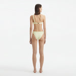 Eyre Yellow One Shoulder Mid Coverage Textured Bikini Set | Moeva | | Each week unveils new pieces—luxury swimwear, fluid resort silhouettes, and elevated summer-to-evening essentials designed to carry you from coastal escapes to city nights.
