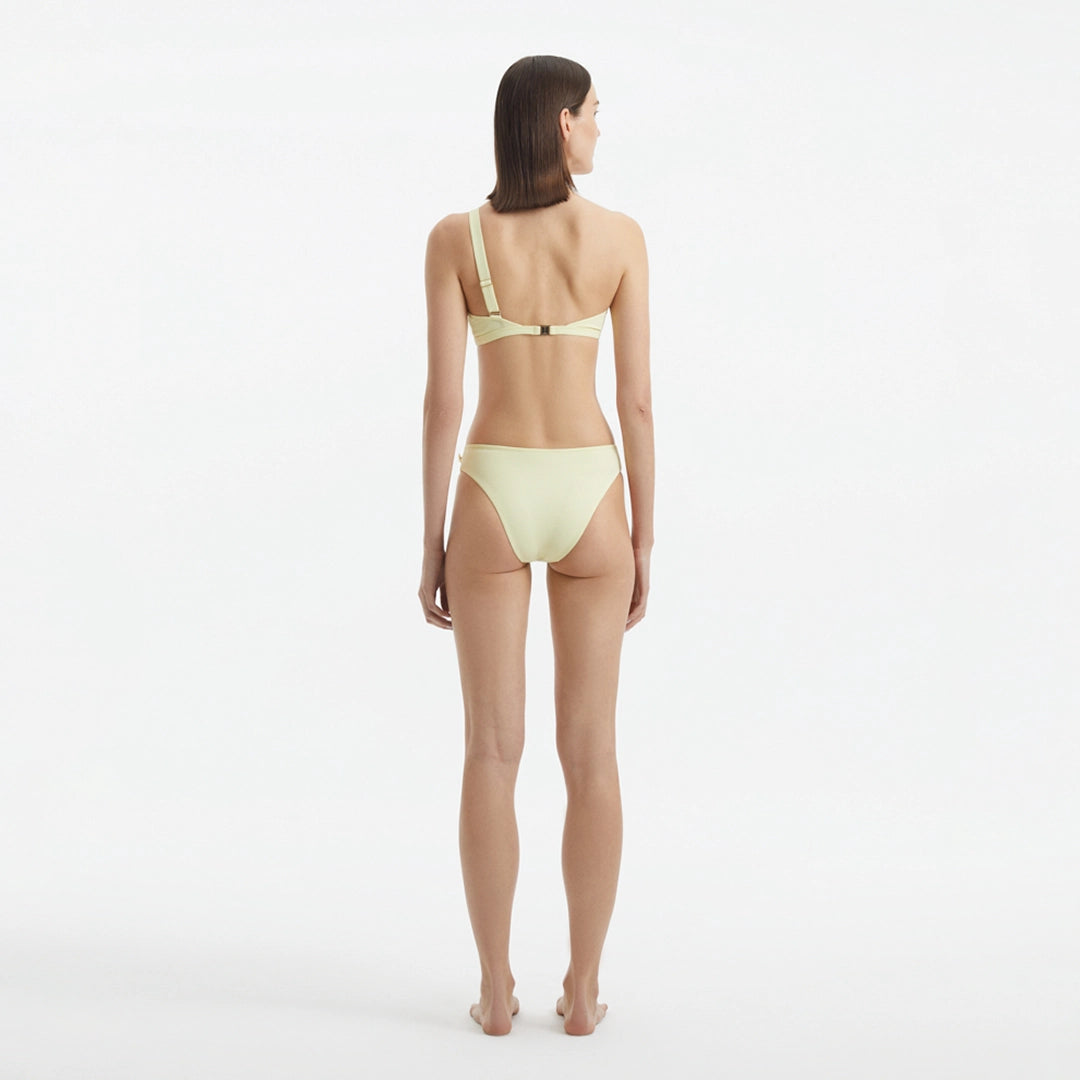 Eyre Yellow One Shoulder Mid Coverage Textured Bikini Set | Moeva | Bikini Set | Each week unveils new pieces—luxury swimwear, fluid resort silhouettes, and elevated summer-to-evening essentials designed to carry you from coastal escapes to city nights.