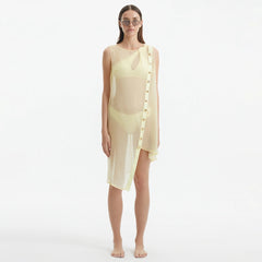 Adora Yellow Sheer Sleeveless Asymmetric Dress with Gold Button Detail | Moeva | Dress | Each week unveils new pieces—luxury swimwear, fluid resort silhouettes, and elevated summer-to-evening essentials designed to carry you from coastal escapes to city nights.