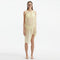 Adora Yellow Sheer Sleeveless Asymmetric Dress with Gold Button Detail | Moeva | Dress | Each week unveils new pieces—luxury swimwear, fluid resort silhouettes, and elevated summer-to-evening essentials designed to carry you from coastal escapes to city nights.