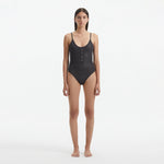 Hartley Silver Scoop Neck Metallic Knitted Swimsuit | Moeva | Swimsuit | Each week unveils new pieces—luxury swimwear, fluid resort silhouettes, and elevated summer-to-evening essentials designed to carry you from coastal escapes to city nights.