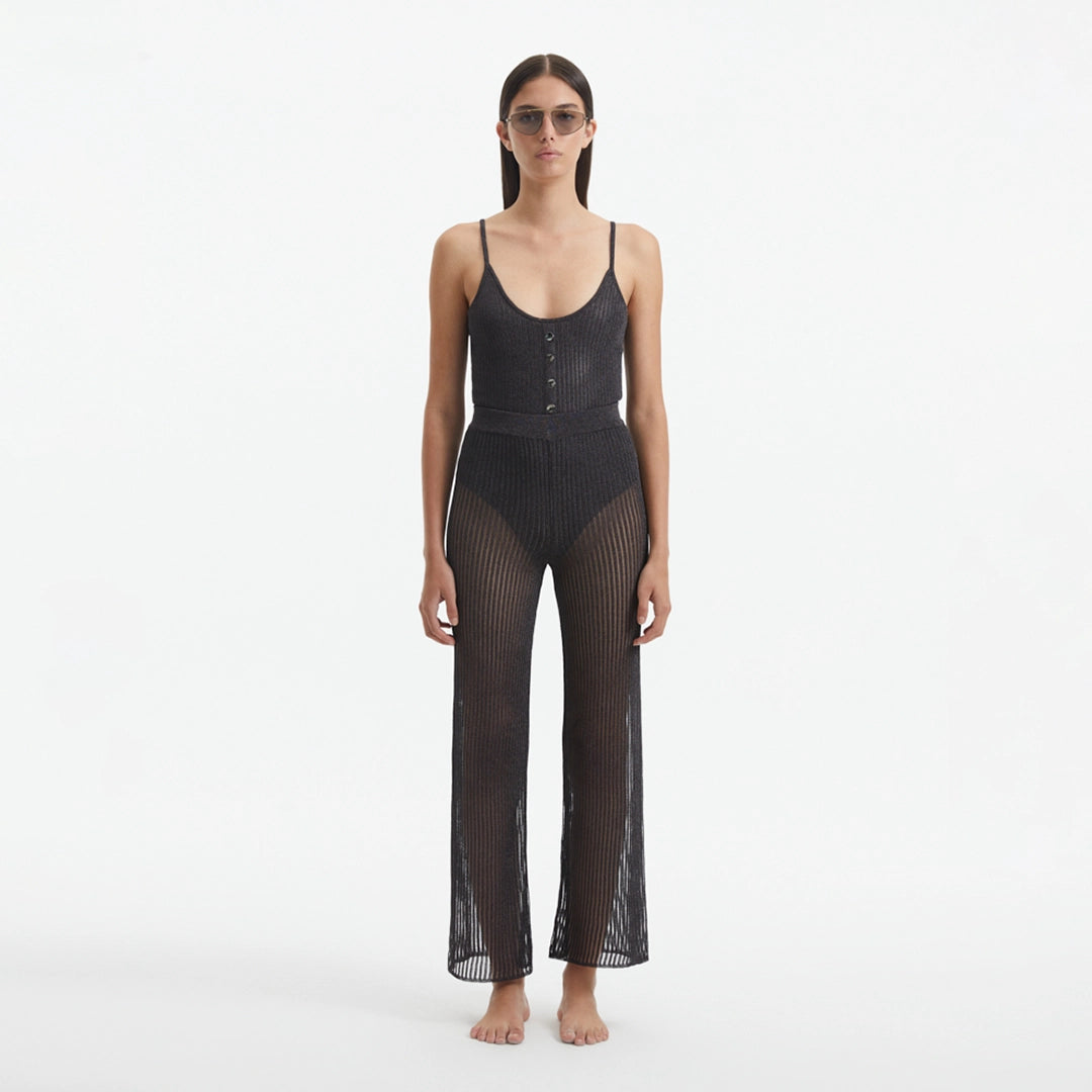 Luz Silver Metallic Sheer Knit Pants | Moeva | Women Beachwear Pants | Each week unveils new pieces—luxury swimwear, fluid resort silhouettes, and elevated summer-to-evening essentials designed to carry you from coastal escapes to city nights.