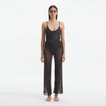 Luz Silver Metallic Sheer Knit Pants | Moeva | Women Beachwear Pants | Each week unveils new pieces—luxury swimwear, fluid resort silhouettes, and elevated summer-to-evening essentials designed to carry you from coastal escapes to city nights.