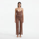 Luz Brown Metallic Sheer Knit Pants | Moeva | Women Beachwear Pants | Each week unveils new pieces—luxury swimwear, fluid resort silhouettes, and elevated summer-to-evening essentials designed to carry you from coastal escapes to city nights.