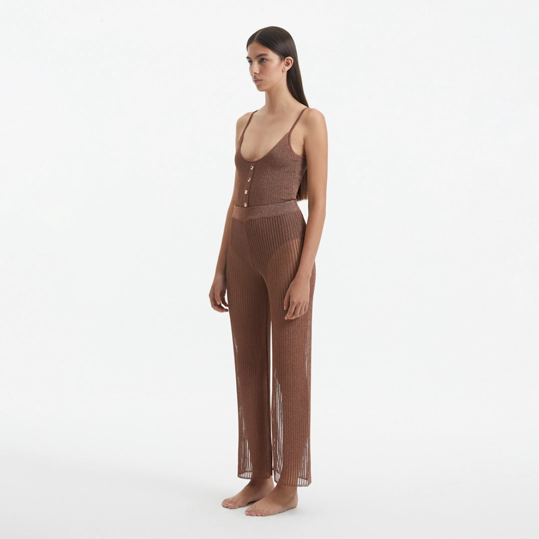 Luz Brown Metallic Sheer Knit Pants | Moeva | Women Beachwear Pants | Each week unveils new pieces—luxury swimwear, fluid resort silhouettes, and elevated summer-to-evening essentials designed to carry you from coastal escapes to city nights.