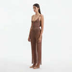 Luz Brown Metallic Sheer Knit Pants | Moeva | Women Beachwear Pants | Each week unveils new pieces—luxury swimwear, fluid resort silhouettes, and elevated summer-to-evening essentials designed to carry you from coastal escapes to city nights.