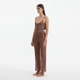 Luz Brown Metallic Sheer Knit Pants | Moeva | Women Beachwear Pants | Each week unveils new pieces—luxury swimwear, fluid resort silhouettes, and elevated summer-to-evening essentials designed to carry you from coastal escapes to city nights.