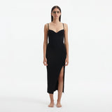Beau Black Sleeveless Knitted Long Dress with Side Slit | Moeva | RTW Dresses | Each week unveils new pieces—luxury swimwear, fluid resort silhouettes, and elevated summer-to-evening essentials designed to carry you from coastal escapes to city nights.
