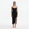 Beau Black Sleeveless Knitted Long Dress with Side Slit | Moeva | RTW Dresses | Each week unveils new pieces—luxury swimwear, fluid resort silhouettes, and elevated summer-to-evening essentials designed to carry you from coastal escapes to city nights.