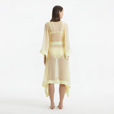 Opal Yellow Sheer Gold Buttoned Belted Kaftan | Moeva | Kaftans | Each week unveils new pieces—luxury swimwear, fluid resort silhouettes, and elevated summer-to-evening essentials designed to carry you from coastal escapes to city nights.