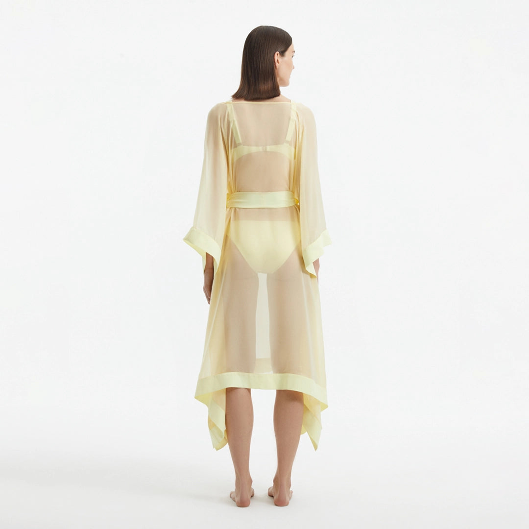 Opal Yellow Sheer Gold Buttoned Belted Kaftan | Moeva | Kaftans | Each week unveils new pieces—luxury swimwear, fluid resort silhouettes, and elevated summer-to-evening essentials designed to carry you from coastal escapes to city nights.