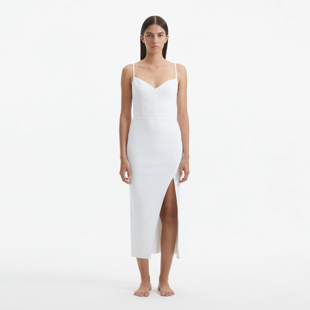 Beau White Sleeveless Knitted Long Dress with Side Slit | Moeva | RTW Dresses | Each week unveils new pieces—luxury swimwear, fluid resort silhouettes, and elevated summer-to-evening essentials designed to carry you from coastal escapes to city nights.
