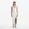 Beau White Sleeveless Knitted Long Dress with Side Slit | Moeva | RTW Dresses | Each week unveils new pieces—luxury swimwear, fluid resort silhouettes, and elevated summer-to-evening essentials designed to carry you from coastal escapes to city nights.