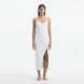 Beau White Sleeveless Knitted Long Dress with Side Slit | Moeva | RTW Dresses | Each week unveils new pieces—luxury swimwear, fluid resort silhouettes, and elevated summer-to-evening essentials designed to carry you from coastal escapes to city nights.