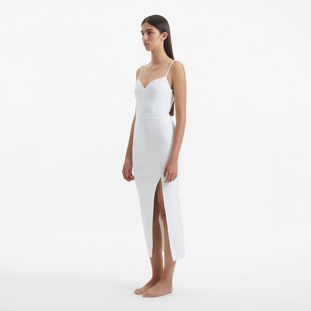 Beau White Sleeveless Knitted Long Dress with Side Slit | Moeva | RTW Dresses | Each week unveils new pieces—luxury swimwear, fluid resort silhouettes, and elevated summer-to-evening essentials designed to carry you from coastal escapes to city nights.