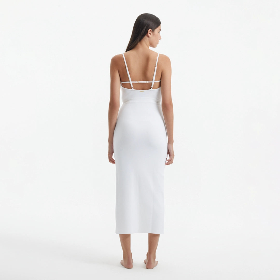 Beau White Sleeveless Knitted Long Dress with Side Slit | Moeva | RTW Dresses | Each week unveils new pieces—luxury swimwear, fluid resort silhouettes, and elevated summer-to-evening essentials designed to carry you from coastal escapes to city nights.
