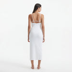 Beau White Sleeveless Knitted Long Dress with Side Slit | Moeva | RTW Dresses | Each week unveils new pieces—luxury swimwear, fluid resort silhouettes, and elevated summer-to-evening essentials designed to carry you from coastal escapes to city nights.