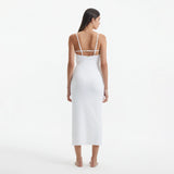 Beau White Sleeveless Knitted Long Dress with Side Slit | Moeva | RTW Dresses | Each week unveils new pieces—luxury swimwear, fluid resort silhouettes, and elevated summer-to-evening essentials designed to carry you from coastal escapes to city nights.