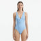 Naida Baby Blue V Neck Textured Swimsuit | Moeva | Swimsuit | Each week unveils new pieces—luxury swimwear, fluid resort silhouettes, and elevated summer-to-evening essentials designed to carry you from coastal escapes to city nights.