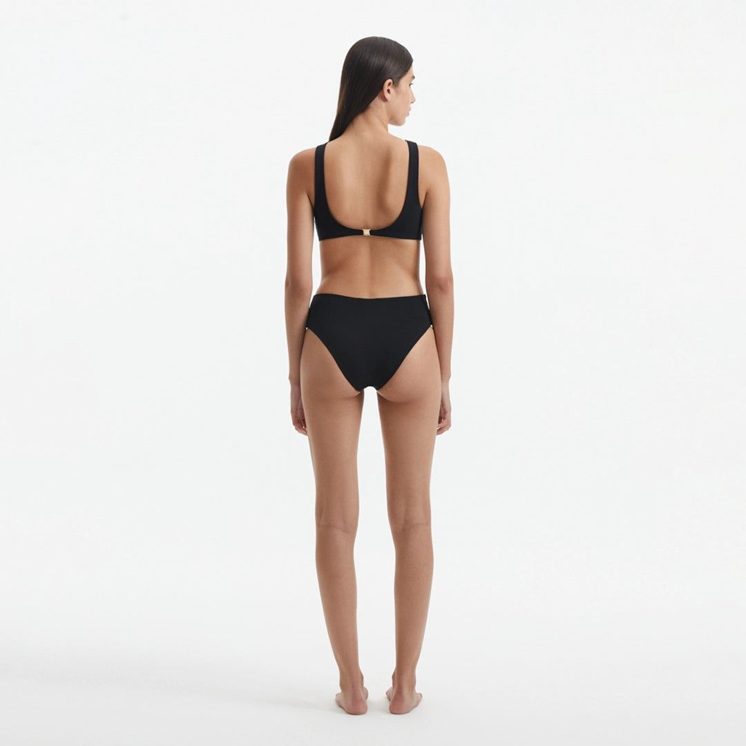 Honora Black High Neck Swimsuit | Moeva | Swimsuit | Each week unveils new pieces—luxury swimwear, fluid resort silhouettes, and elevated summer-to-evening essentials designed to carry you from coastal escapes to city nights.