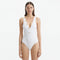 Naida White V Neck Textured Swimsuit | Moeva | Swimsuit | Each week unveils new pieces—luxury swimwear, fluid resort silhouettes, and elevated summer-to-evening essentials designed to carry you from coastal escapes to city nights.