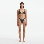 North Silver Mid Coverage Knitted Bikini Bottom | Moeva | Bikini Bottom | Each week unveils new pieces—luxury swimwear, fluid resort silhouettes, and elevated summer-to-evening essentials designed to carry you from coastal escapes to city nights.