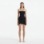 Osaka Black Corset Mini Dress with Wrap Skirt | Moeva | RTW Dresses | Each week unveils new pieces—luxury swimwear, fluid resort silhouettes, and elevated summer-to-evening essentials designed to carry you from coastal escapes to city nights.