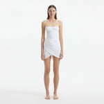 Osaka White Corset Mini Dress with Wrap Skirt | Moeva | RTW Dresses | Each week unveils new pieces—luxury swimwear, fluid resort silhouettes, and elevated summer-to-evening essentials designed to carry you from coastal escapes to city nights.