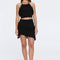 Nebula And Arlo Fringe Asymmetric Black Knit Set | Moeva | | Each week unveils new pieces—luxury swimwear, fluid resort silhouettes, and elevated summer-to-evening essentials designed to carry you from coastal escapes to city nights.