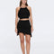 Nebula Black Fringe Detail Halter Knit Top | Moeva | RTW Bustiers | Each week unveils new pieces—luxury swimwear, fluid resort silhouettes, and elevated summer-to-evening essentials designed to carry you from coastal escapes to city nights.