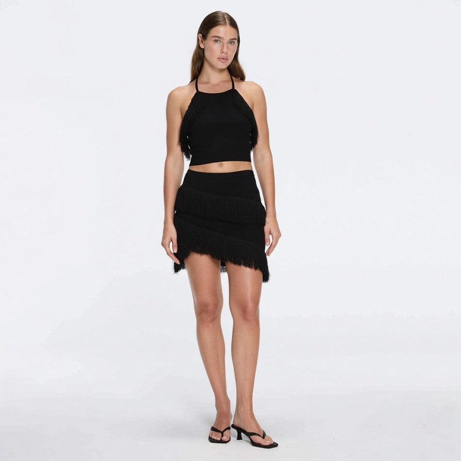 Nebula And Arlo Fringe Asymmetric Black Knit Set | Moeva | Set | Each week unveils new pieces—luxury swimwear, fluid resort silhouettes, and elevated summer-to-evening essentials designed to carry you from coastal escapes to city nights.