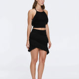 Nebula And Arlo Fringe Asymmetric Black Knit Set | Moeva | | Each week unveils new pieces—luxury swimwear, fluid resort silhouettes, and elevated summer-to-evening essentials designed to carry you from coastal escapes to city nights.