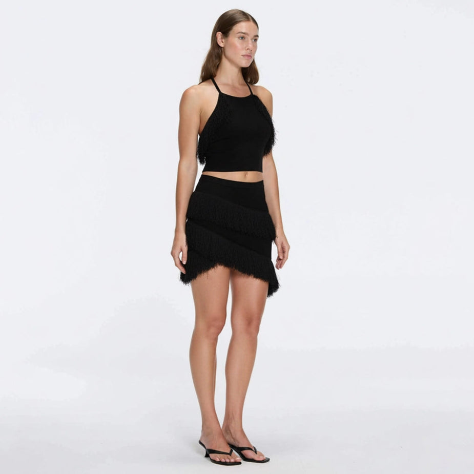 Nebula And Arlo Fringe Asymmetric Black Knit Set | Moeva | Set | Each week unveils new pieces—luxury swimwear, fluid resort silhouettes, and elevated summer-to-evening essentials designed to carry you from coastal escapes to city nights.