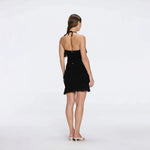 Nebula And Arlo Fringe Asymmetric Black Knit Set | Moeva | | Each week unveils new pieces—luxury swimwear, fluid resort silhouettes, and elevated summer-to-evening essentials designed to carry you from coastal escapes to city nights.