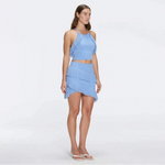 Nebula And Arlo Fringe Asymmetric Blue Knit Set | Moeva | | Each week unveils new pieces—luxury swimwear, fluid resort silhouettes, and elevated summer-to-evening essentials designed to carry you from coastal escapes to city nights.