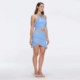Nebula And Arlo Fringe Asymmetric Blue Knit Set | Moeva | | Each week unveils new pieces—luxury swimwear, fluid resort silhouettes, and elevated summer-to-evening essentials designed to carry you from coastal escapes to city nights.