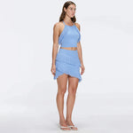 Arlo Baby Blue Fringe Detail Asymmetric Mini Skirt | Moeva | RTW Skirts | Each week unveils new pieces—luxury swimwear, fluid resort silhouettes, and elevated summer-to-evening essentials designed to carry you from coastal escapes to city nights.