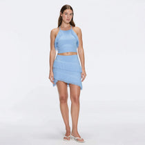 Nebula And Arlo Fringe Asymmetric Blue Knit Set | Moeva | | Each week unveils new pieces—luxury swimwear, fluid resort silhouettes, and elevated summer-to-evening essentials designed to carry you from coastal escapes to city nights.